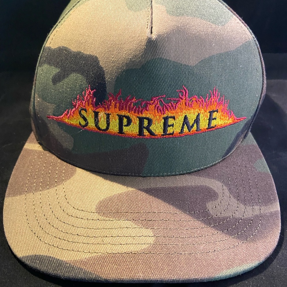 NWOT camouflage baseball hat.